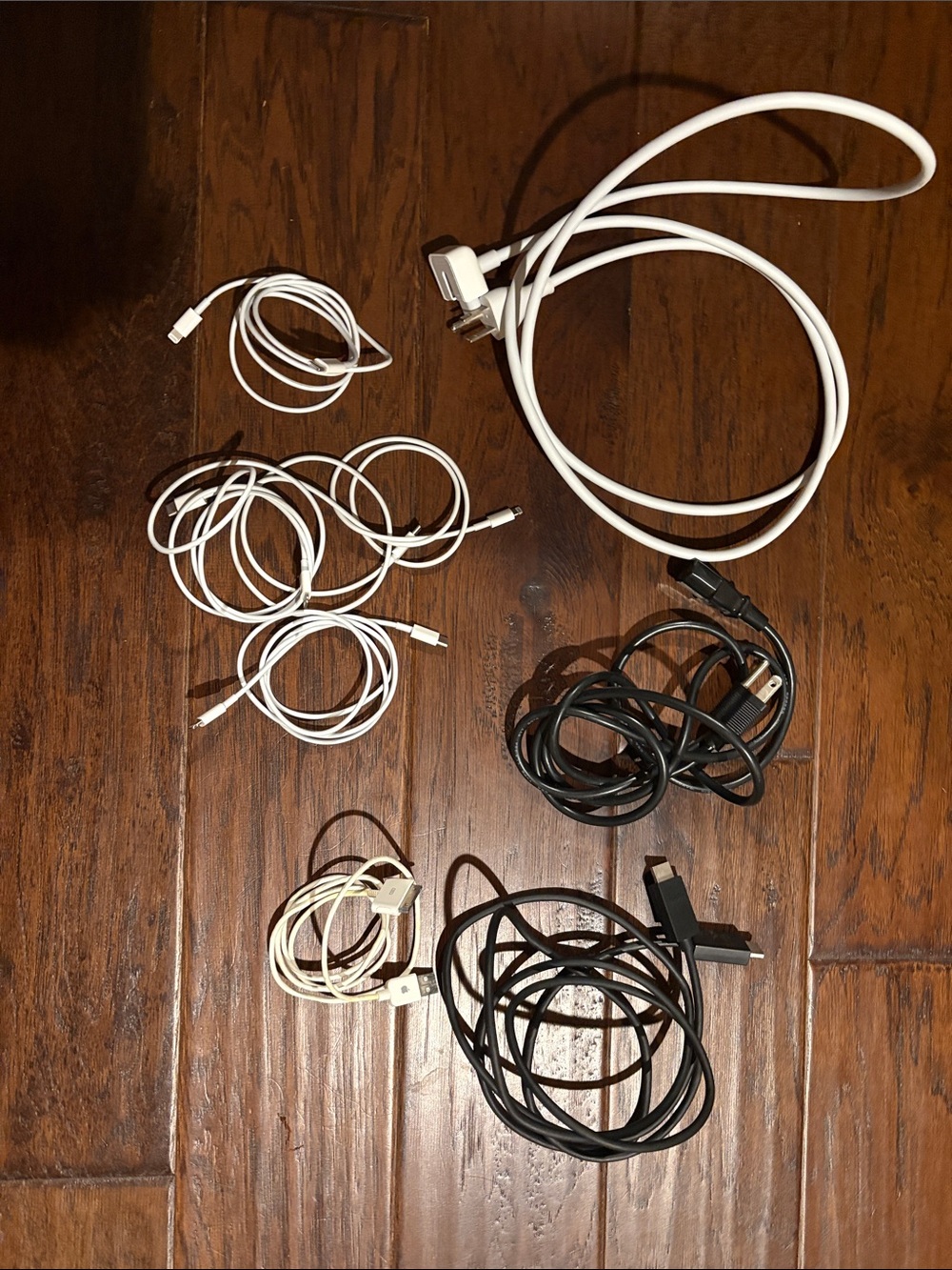 Assorted White and Black Charging Cables and Chargers - Cell Phone Accessories